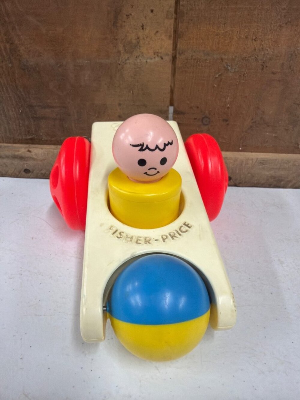 Vintage Fisher-Price 1975 Click N Clatter Push Toy With Red Wheels & Yellow Base